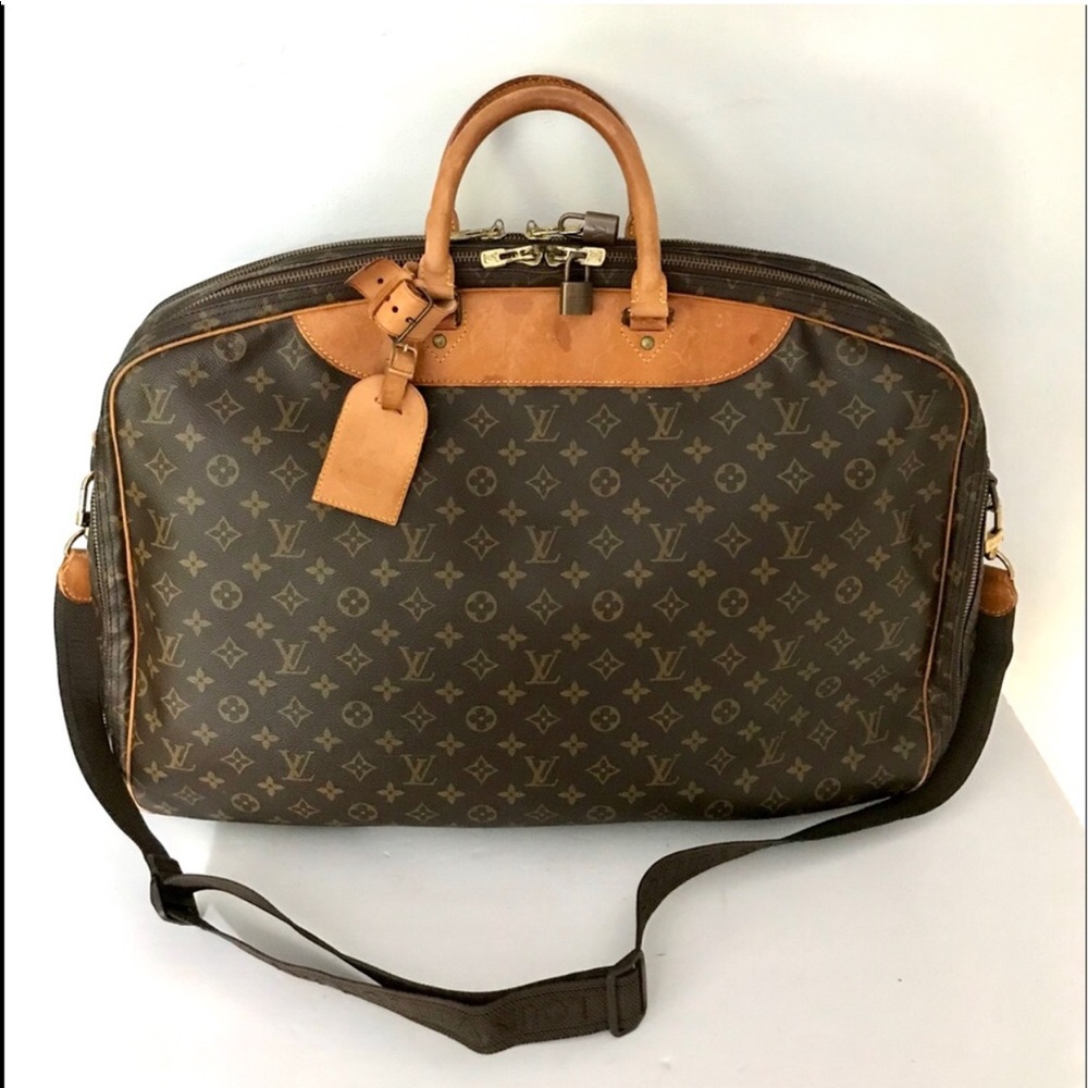 Authentic Louis Vuitton Alize 24 2 way travel bag with strap